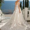 Buy Sell Wedding Dress Online Dubai UAE Ivory Coloured Justin Alexander A-Line dress with off the shoulders neckline. Made of Tulle and Lace. Size Large