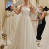 Buy Sell Wedding Dress Online Dubaie UAE BrandNew white A-Line gown by Ukrainian designer Vintage with straight across neckline. Sizer Small- Medium
